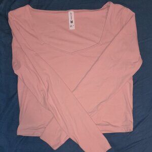 Peach/pink long sleeve crop top